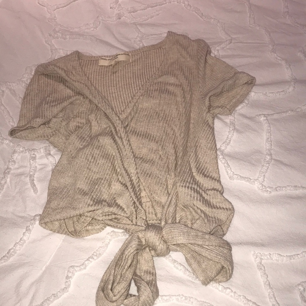 cropped tee with a tie at the bottom